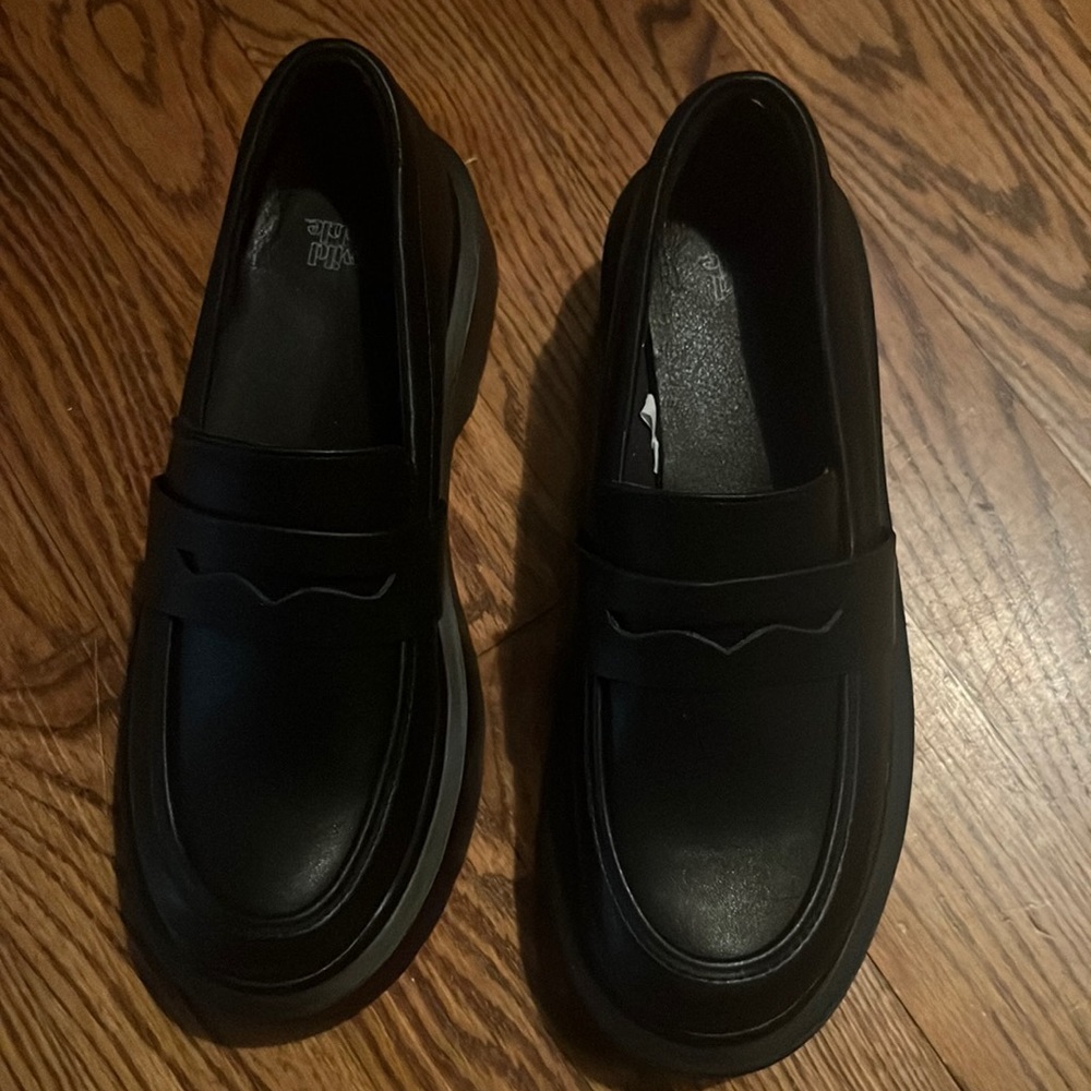Black loafers